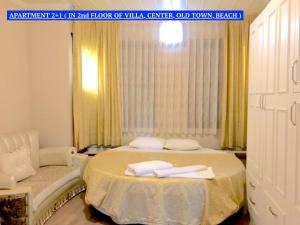 Katil atau katil-katil dalam bilik di ROOMS AND APARTMENTS center of Antalya, beach, old town