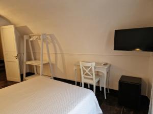 Voodi või voodid majutusasutuse B&B L'Orto Sul Tetto toas