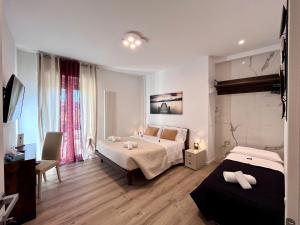 Postel nebo postele na pokoji v ubytování verona rooms 109