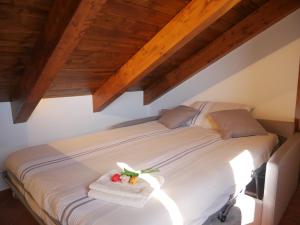 Letto o letti in una camera di Casa Mercurio