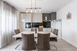 Kuchyň nebo kuchyňský kout v ubytování Apartman Bella Vita