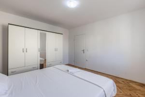 Postel nebo postele na pokoji v ubytování Apartman Bella Vita