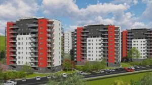zwei rot-weiße Apartmenthäuser in einer Stadt in der Unterkunft Apartament Relaxa Green 1 in Târgu Mureș