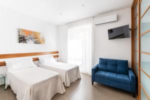 Letto o letti in una camera di Gli Archi Spoleto