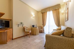 TV a/nebo společenská místnost v ubytování Hotel Relax