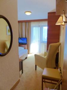 TV a/nebo společenská místnost v ubytování Hotel Garni Zerzer