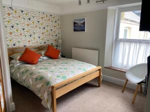 Katil atau katil-katil dalam bilik di Channel Vista Guest House