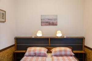 Postel nebo postele na pokoji v ubytování Apartmani Papeš