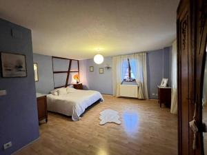 Posteľ alebo postele v izbe v ubytovaní Gîte La maison de Jules