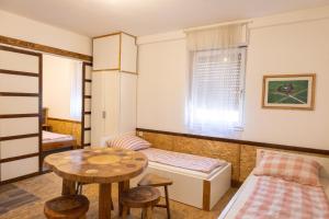 Postel nebo postele na pokoji v ubytování Apartmani Papeš