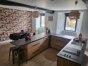 Zdjęcie z galerii obiektu Charmante maison près du canal w mieście Tinténiac