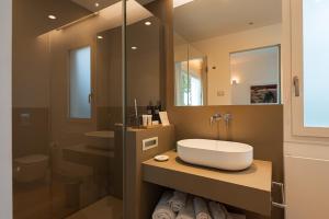 חדר רחצה ב-Unìco Boutique Hotel d'Arte