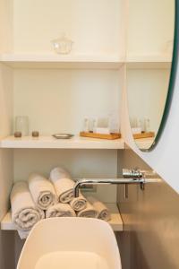 תמונה מהגלריה של Unìco Boutique Hotel d'Arte במונדלו