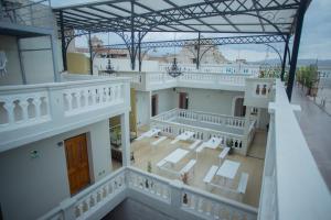 an aerial view of a building with a balcony at Hostal TELSA SWEET STAY Inkahoteles in Arequipa