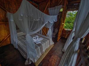 Ένα ή περισσότερα κρεβάτια σε δωμάτιο στο Donde se Oculta el Sol +22 φωτογραφίες