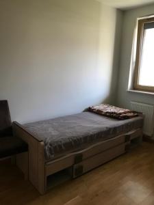Posteľ alebo postele v izbe v ubytovaní Appartement Nowa Huta