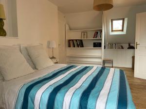 Posteľ alebo postele v izbe v ubytovaní La Maison Verte a Etables sur Mer