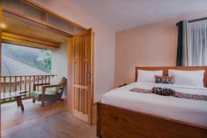 Una cama o camas en una habitación de Gorilla Leisure Lodge