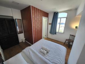 Postel nebo postele na pokoji v ubytování Haifa Hostel