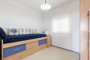 A bed or beds in a room at Apartamento Mare Nostrum