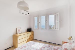 A bed or beds in a room at Apartamento Mare Nostrum Még 30 kép