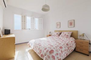 A bed or beds in a room at Apartamento Mare Nostrum