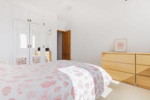 A bed or beds in a room at Apartamento Mare Nostrum