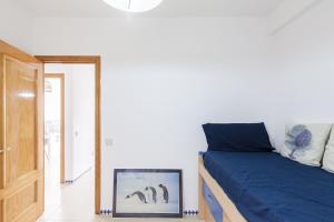 A bed or beds in a room at Apartamento Mare Nostrum