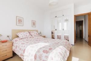 A bed or beds in a room at Apartamento Mare Nostrum