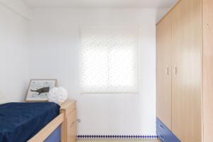A bed or beds in a room at Apartamento Mare Nostrum