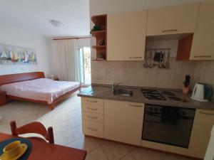 Gallery image of Olive garden Pag studio apartment in Pag +23 photos