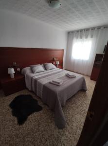 Postel nebo postele na pokoji v ubytování Costa Alcázares
