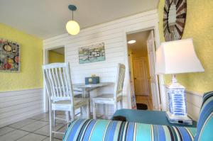 a dining room with a table and chairs at Starfish Villa in Panama City Beach
