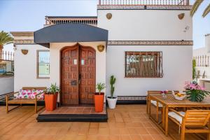Balkón nebo terasa v ubytování Villa Corralejo Bay Beachfront Corralejo By Holidays Home