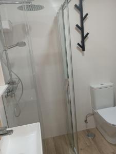 Koupelna v ubytování Fantástico piso con piscina y balcón en el Medano