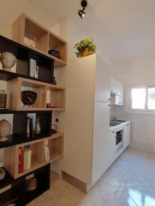 A kitchen or kitchenette at Vatican Walls Apartment
