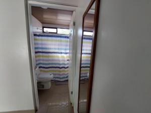 Postel nebo postele na pokoji v ubytování Hotel Carlota Tamarindo
