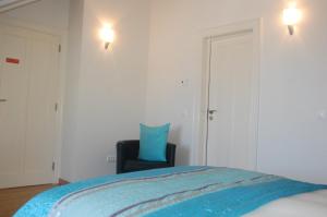 Кровать или кровати в номере Residence Lagos
