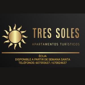 un cartel que dice que los árboles se venden con un sol amarillo en APARTAMENTOS TRES SOLES en Écija