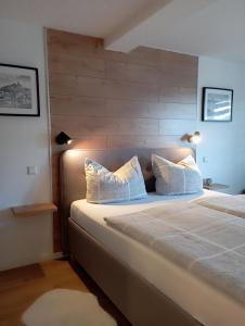 Postel nebo postele na pokoji v ubytování Kleines Moselchalet