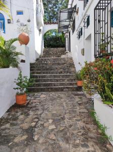 Fotografie z fotogalerie ubytování Cabaña 41, aldea Doradal Santorini Colombiano v destinaci Puerto Triunfo