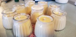 a group of mason jars filled with milk at Goin' Bonanza Glamping Ranch in Hardy