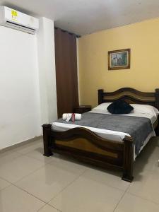 Posteľ alebo postele v izbe v ubytovaní HOTEL HISPANO