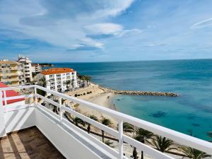 a balcony with a view of the ocean at Respiro Del Mar - Beachfront Superior Apartment in L'Ametlla de Mar