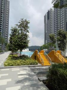 a skate park with a slide in a city at QAISARA D'SAVANNA HOMESTAY@SOUTHVILLE CITY in Bangi +12 photos