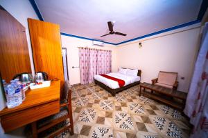 Uma cama ou camas num quarto em Dharma Backpackers