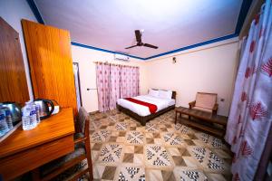 Uma cama ou camas num quarto em Dharma Backpackers