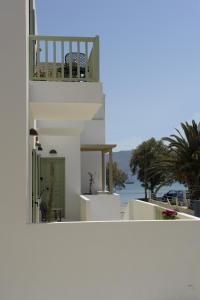 a view of a white building with a balcony at Almyris in Adamantas