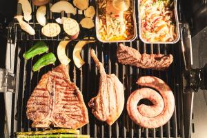 a grill with different types of food on it at Villa Saison Fuji ヴィラ セゾン フジ in Fujikawaguchiko +43 photos