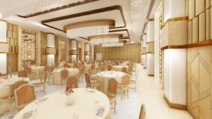 a rendering of a restaurant with tables and chairs at Green Mapple in Muzaffarpur